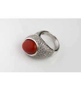White gold ring with red...